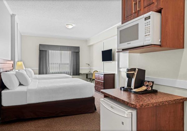 Guest room two queens with microwave Guest room two queens with microwave